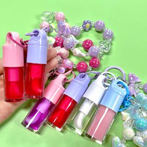 Brillo labial vegano rosa a prueba de agua, libre de crueldad animal, con lazo y llavero, etiqueta privada, DIY, aceite labial, brillo labial con pompón, venta al por mayor - Product Image 4