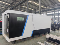Machine de découpe laser à fibre populaire haute puissance 6025 6015 6024 de type fermé avec double table d'échange 12kw 20kw 30kw