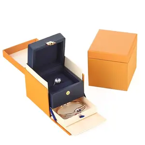 Lüks üst sınıf kuşe kağıt dış Packer turuncu deri halka kolye takı ambalaj kutusu Metal düğme ile