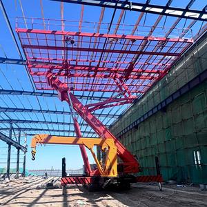 Plataforma elevadora móvil sobre orugas con elevación inversa y sistema hidráulico para trabajos en muros cortina - Product Image 1