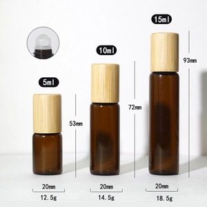 ขวดแก้วทรงกระบอกสีน้ำตาลอำพันใสหรูหราขนาด 3 มล. 5 มล. 10 มล. ยี่ห้อ LK Packaging พร้อมฝาไม้สำหรับน้ำมันหอมระเหยและน้ำหอม - Product Image 5