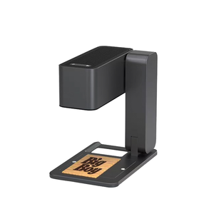 Mini Máquina de Grabado Láser de Fibra Plegable con Capacidad 3D para Grabado de Logotipos en Cuero y Bambú, Compatible con Formatos AI/DWG/DST/BMP - Product Image 1