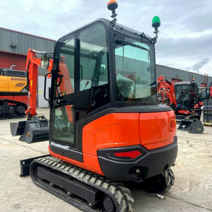 Mini-excavatrice sur chenilles orange et noire avec cabine, chenilles et éclairage à vendre - Kubota KX027-4 - Product Image 1