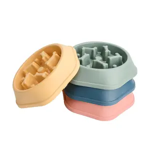 Nuovo materiale PP a forma di osso cilindrico pet slow food bowl ciotola per cibo per gatti slow food ciotola anti-soffocamento per cani e gatti