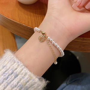 Bracciali con perline di perle di <span class=keywords><strong>coppia</strong></span> regalo <span class=keywords><strong>braccialetti</strong></span> da donna con ciondoli di temperamento di design all'ingrosso - Product Image 6