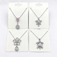 Collier tendance XUPING pour femme en alliage de cuivre avec pendentif en forme d'étoile, de fleur et de goutte d'eau - Formes multiples