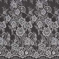 Tissu en dentelle française blanche à motif floral pour robes de mariée élégantes