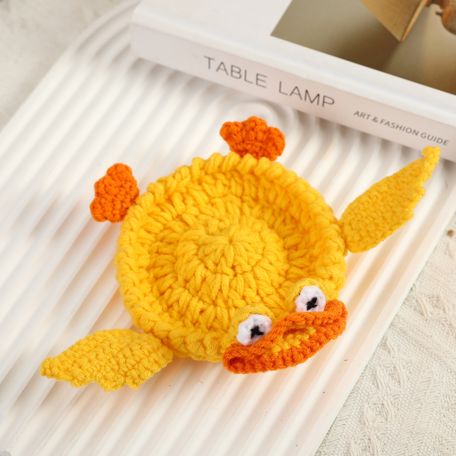Dessous de verre jaune vilain petit canard