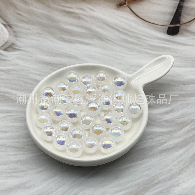 Perle ronde en porcelaine de couleur blanche