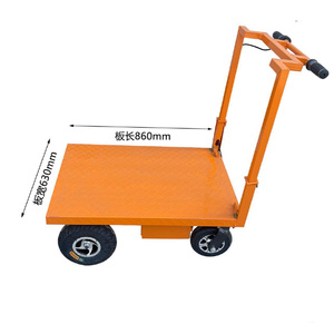 Carretilla manual naranja de 860 mm de largo y 630 mm de ancho con asa y ruedas para transporte en obras de construcción - Product Image 1