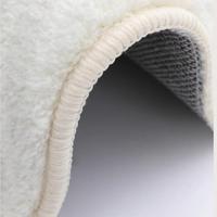 Tapis circulaire tissé à la machine dans le salon, tapis antidérapant et imperméable et tapis circulaire dans la chambre à coucher.
