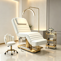 Table de massage électrique de luxe à 3 moteurs, base dorée, en cuir PU, réglable, pour salon de beauté et esthéticiennes (vente en gros)