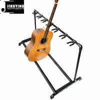 2024 Supports de guitare de musique Jingying, vente en gros de supports de guitare pliants à 7 têtes présentoirs d'étagères de guitare multi-têtes