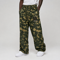 Pantalon de survêtement ample et épais en polyester personnalisé avec broderie de patchs, imprimé camouflage intégral et lettres en relief, avec cordon de serrage