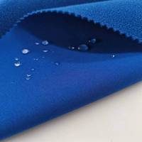 A prueba de viento cálido transpirable 4 vías estiramiento impermeable poliéster Softshell tela para traje de esquí chaqueta