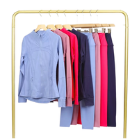Ensemble de yoga personnalisé pour femme : veste et leggings taille haute, unis, froncés, à fermeture éclair, séchage rapide, respirants et écologiques pour la gym