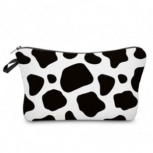 Pochette de maquillage imperméable à imprimé vache, sac de voyage portable pour femmes et filles - Product Image 1