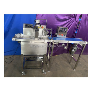 Machine pratique et abordable pour enrober les noix de cajou de chocolat - Product Image 1