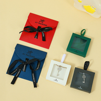 Ensemble de pochettes à bijoux et boîtes de présentation A1 Teal avec fermeture à nœud et bouton, et emballage personnalisé avec logo