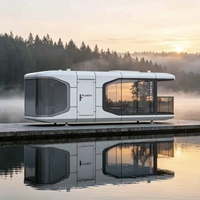Maison préfabriquée Royalstar N28 Ultra Chine, maison préfabriquée à ossature acier pour unité de capsule spatiale de vacances en bord de lac