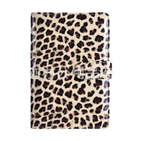 Carnet à spirales A6 en cuir PU imprimé léopard pour usage promotionnel, avec couverture de planificateur personnel à feuilles mobiles et boucle magnétique