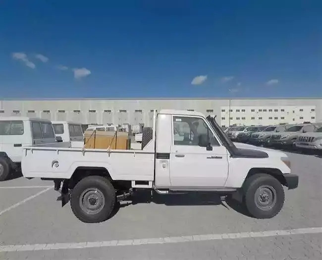 Toyota Land Cruiser пикап 6 колёсный