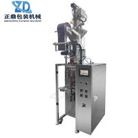 Machine d'emballage automatique pour sachets à trois soudures avec alimentation par aspiration et pince de tirage pour granulés, noix et miettes