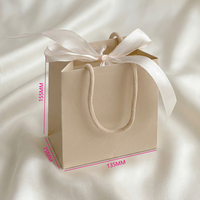 Sacs en papier pour bijoux avec poignée, ruban et nœud, pour emballage cadeau, fournitures professionnelles en gros pour petites entreprises, avec logo personnalisé