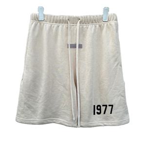Short décontracté à séchage rapide et respirant à imprimé floqué pour homme, taille haute avec fermeture à cordon de serrage, taille moyenne, teint uni - Product Image 1