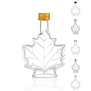 Bouteille de sirop en verre vide en forme de feuille d'érable, bouteille de liqueur en verre avec couvercle, vente en gros, 50ml, 100ml