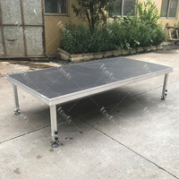 Plataforma de escenario ajustable en altura de aluminio de cuatro patas para escenario de concierto portátil al aire libre de fácil instalación al por mayor para eventos