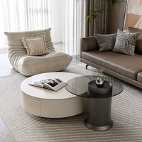 Table basse en métal avec plateau en pierre, espace de rangement, design moderne et minimaliste pour salon, maison, petit appartement, blanc crème