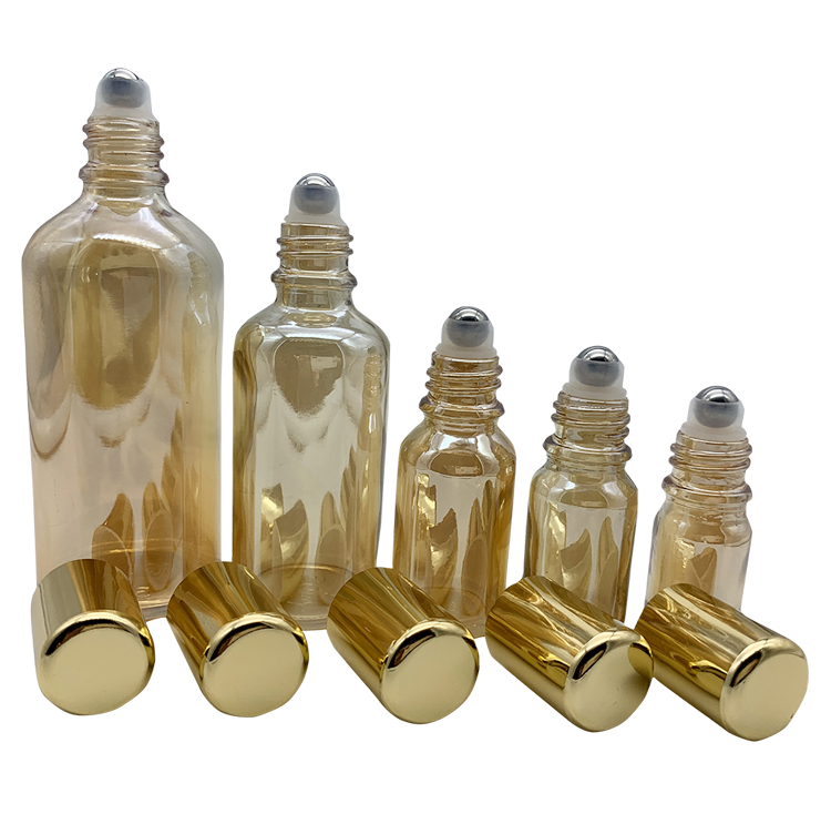 Luxury Golden Glass Roll On Bottles 50ml 100ml Glass Vials With Roller Ball