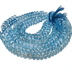 Cuentas facetadas de topacio azul cielo natural en forma de rondel, vendidas por hebra de 8 pulgadas de largo - Product Image 1
