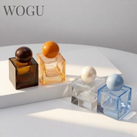 WOGU Flacon pulvérisateur de parfum en verre serti 50 ml, embout rond de 15 mm, emballage cosmétique, flacon de parfum vide carré peint