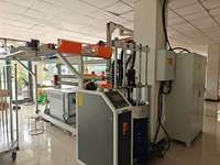 Machine à plastifier électrique double usage pour adhésifs thermofusibles et à base d'huile, avec emballage en film pour textiles et vêtements de protection