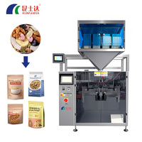 Petit équipement d'emballage de remplissage vertical à quatre têtes Machine d'emballage de sachets de bonbons durs à petits granulés pour casse-croûte de sucre de noix