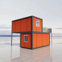 Maison conteneur préfabriquée pliable de 20 pieds, à deux étages, avec carport, garage et terrasse, finition grain de bois, en acier isolé, personnalisable OEM ODM
