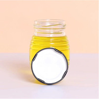 Kosong bening 250ml 500ml 1000ml stoples madu kaca sarang lebah bentuk penyimpanan makanan kaca Jam madu Jar dengan tutup sekrup aluminium