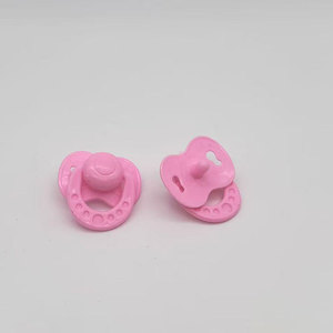 Muñeca Bebé Profesional de 27 cm con Chupete, Traje Morado y Diadema con Lazo para Niños y Niñas - Product Image 5
