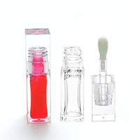 Flacon de brillant à lèvres transparent vide en PET rond avec grand applicateur, tubes repulpants pour les lèvres, emballage