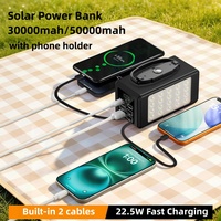 Lampe de poche portable 50000mAh pour le camping, banque d'alimentation solaire 30000mAh à charge rapide avec 2 câbles intégrés