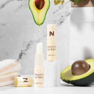 Logo personnalisé Traitement aux plantes Soin des lèvres Cire d'abeille Luxe Marque privée Réparation Ushas Vitamine E Baume à lèvres - Product Image 1