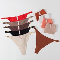 Sous-vêtements érotiques sexy de style européen et américain pour femmes, fines bretelles, boucle à anneau métallique, string taille basse, respirant, en nylon et coton, couleur chair