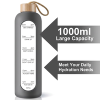 Bouteille d'eau en verre 32oz avec manchon en silicone et couvercle en bambou, marqueurs de temps motivants pour la gym et les sports