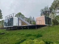 Cabane Apple miniature moderne de luxe en acier préfabriqué pour habitation ou utilisation comme maison-conteneur