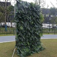 Vente en gros Mur de fleurs de mariage Plante verte artificielle Mur de fleurs de verdure Décoration intérieure de la jungle Panneau mural de plantes en gazon artificiel