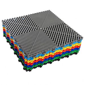 Dalles de sol modulaires rigides en plastique emboîtables et colorées, pratiques pour atelier, garage, et atelier de detailing automobile - Product Image 1