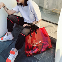 Sac fourre-tout transparent noir en PVC imperméable irisé avec poignée, en stock