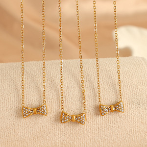 Collier pendentif nœud papillon en acier inoxydable, serti de diamants blancs, bijoux de mode pour femmes - Product Image 1